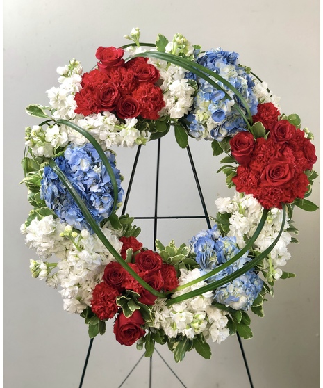 Blue & White Funeral Flower Wreath by Everyday Flowers