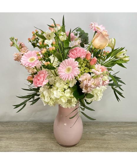 cream and white flower arrangement