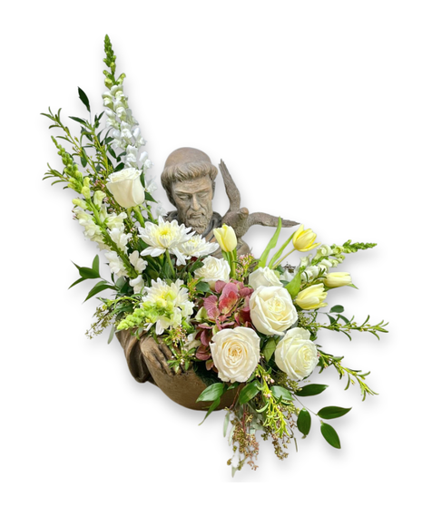 flowers in saint francis shaped vase